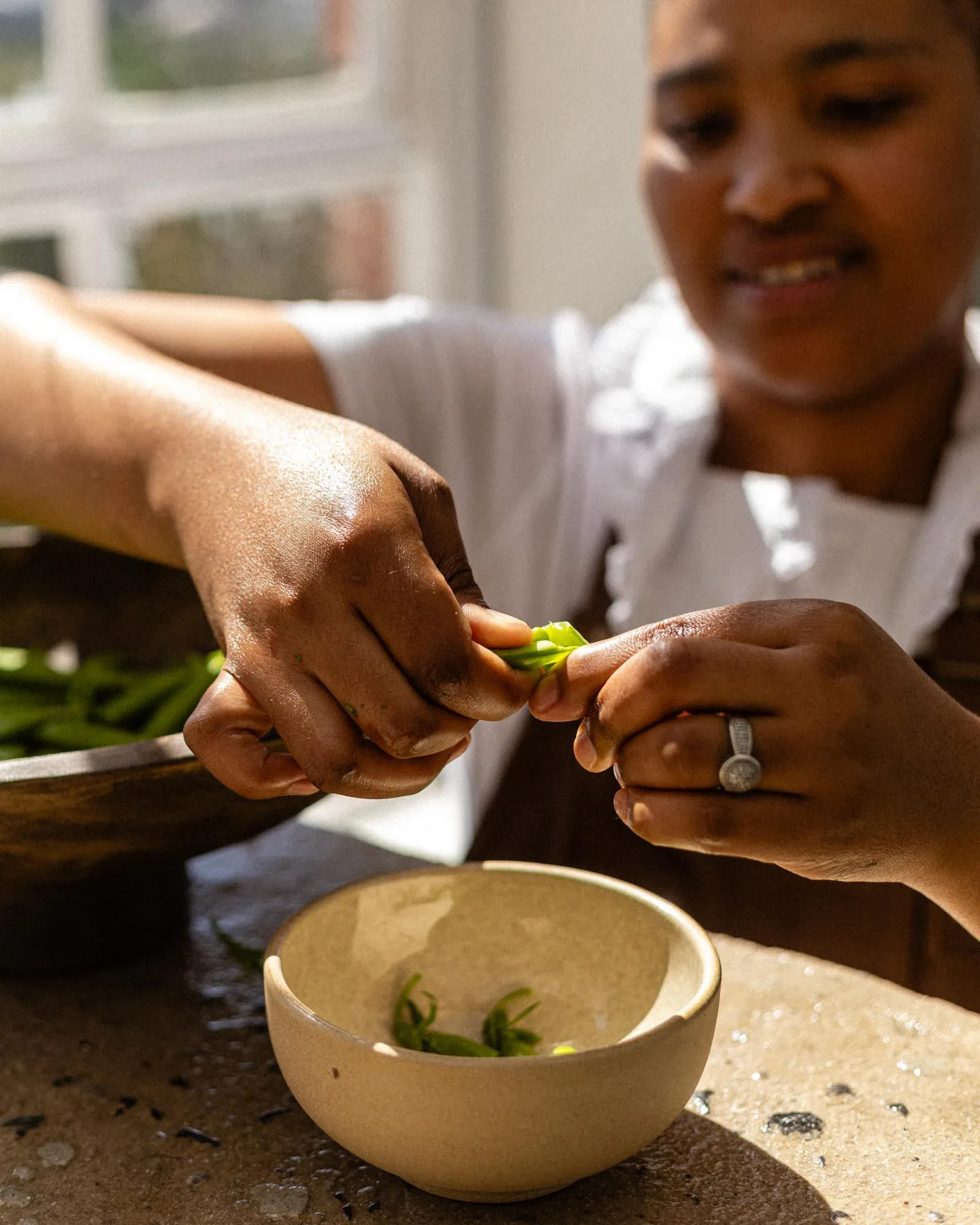 A chef preparing a dish in a BlackBrick kitchen