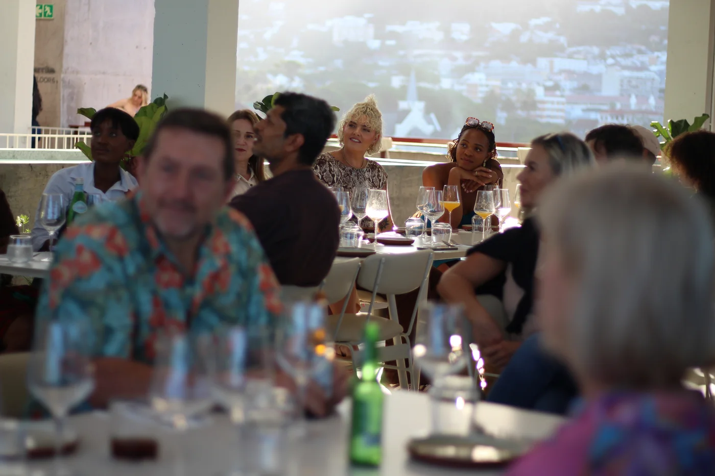 Guests gathered around dining tables at BlackBrick